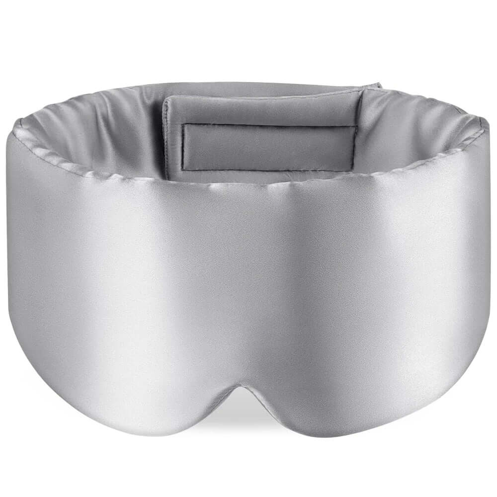 Premium Mulberry Silk Sleep Mask for Side Sleepers in silver, designed for ultimate comfort and blackout.